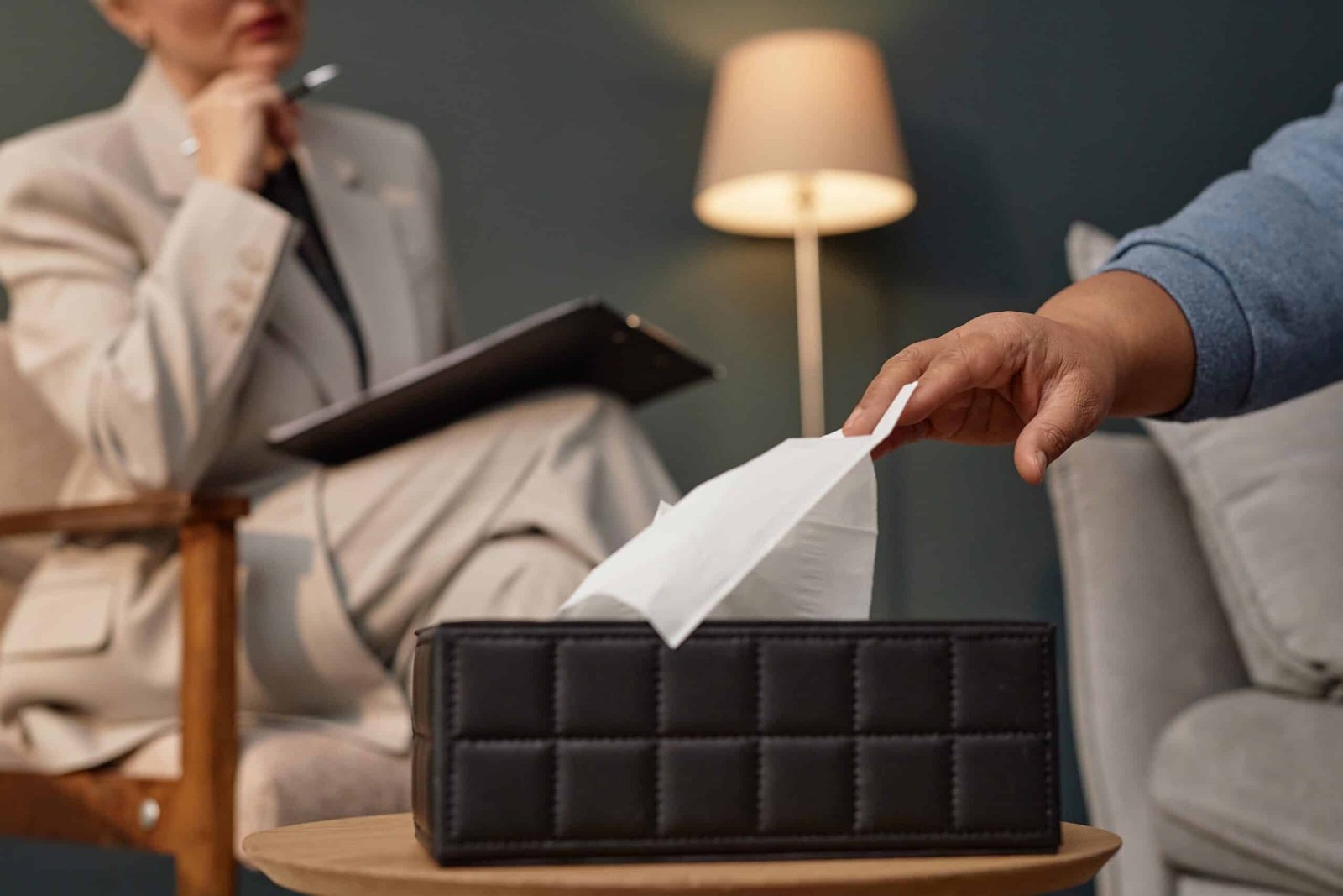 Young black and caucasian woman having good time, drinking fresh