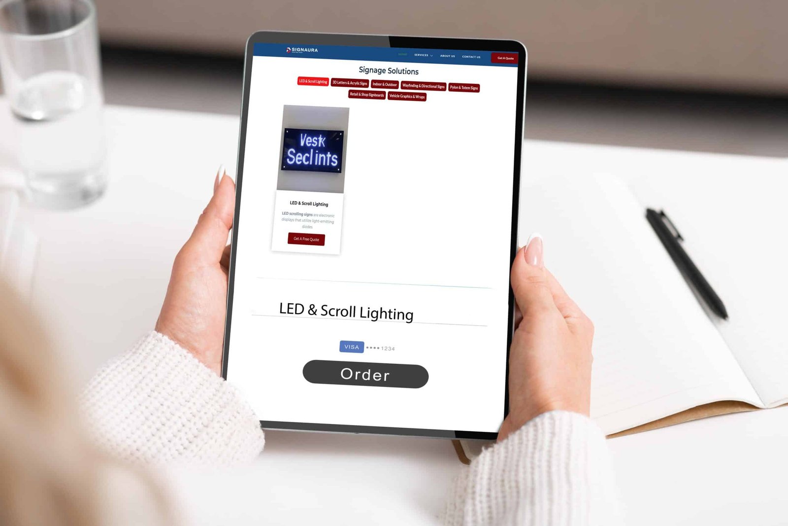 Modern technology, mobile app and trendy vegetarianism. Woman orders food at tablet